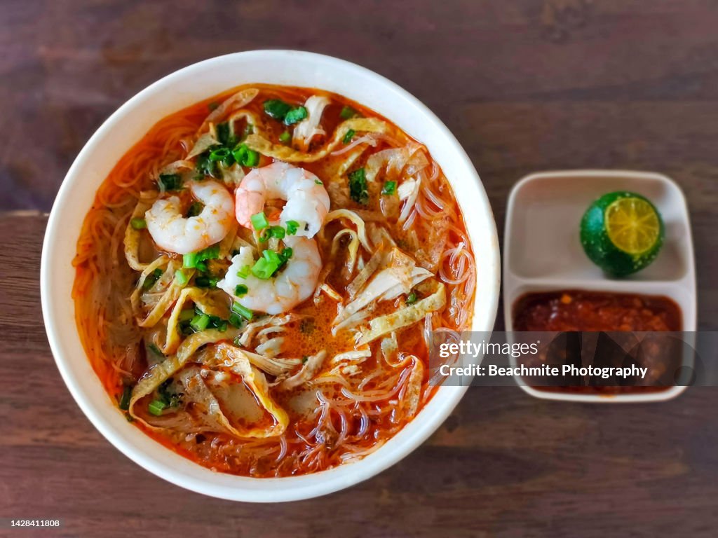 Laksa Sarawak - Noodle ,egg, prawns and chicken in a spicy broth