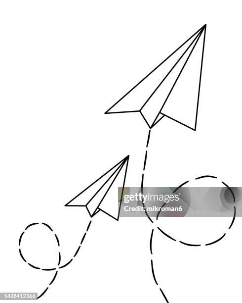 vector illustration of a paper plane flying in air. - success vector stock pictures, royalty-free photos & images