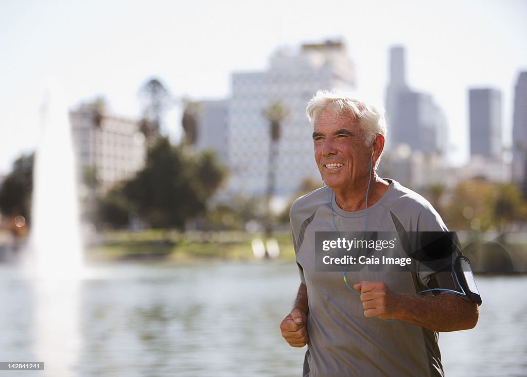 Older man jogging outdoors