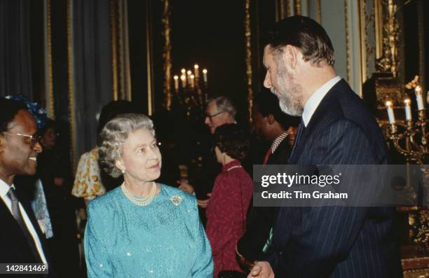 Queen Elizabeth II meets Terry Waite at a Commonwealth Day reception in London, March 1992.