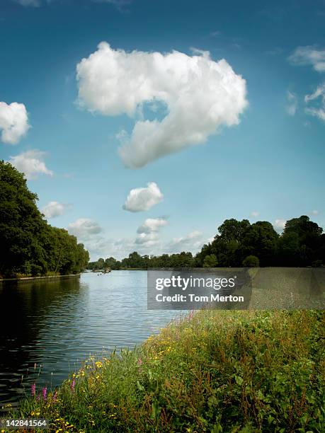 question mark in clouds over rural landscape - punto di domanda foto e immagini stock