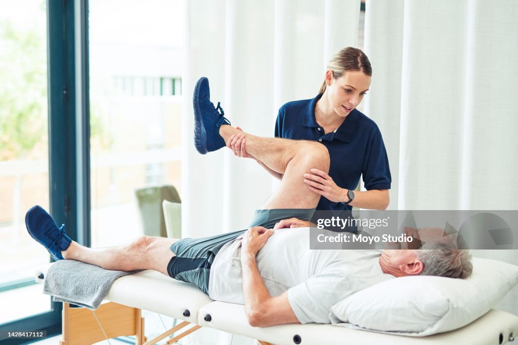 Physiotherapy doctor, senior patient and leg surgery, physical therapy and orthopedic healing. Physiotherapist, chiropractor and nurse help elderly injury, osteoporosis and arthritis rehabilitation