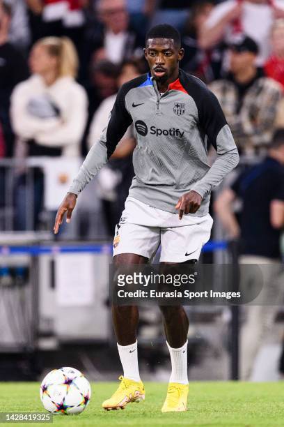 Ousmane Dembélé of Barcelona warming up during the UEFA Champions League group C match between FC Bayern München and FC Barcelona at Allianz Arena on...