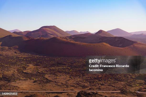 volcanic landscape, timanfaya national park, lanzarote, canary islands - francesco riccardo iacomino spain stock pictures, royalty-free photos & images