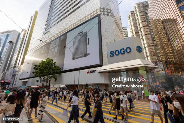 causeway bay in hong kong - sogo stock pictures, royalty-free photos & images