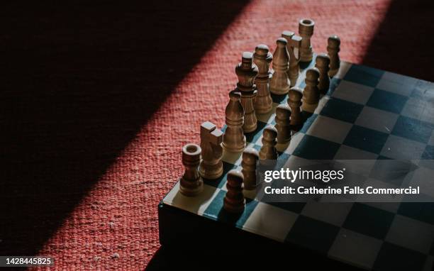 close-up of a chessboard - ajedrez fotografías e imágenes de stock