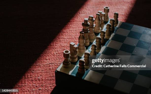 close-up of a chessboard - chess stock pictures, royalty-free photos & images