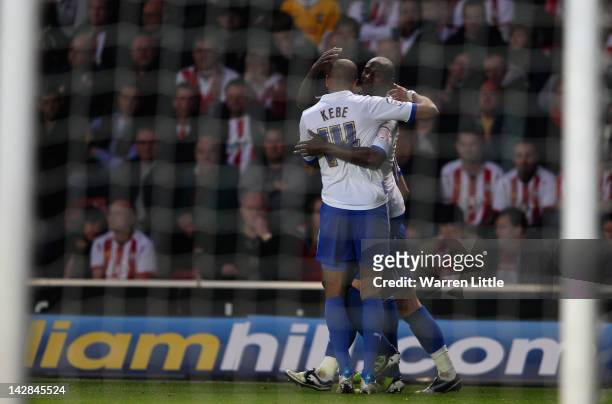 Jason Roberts of Reading is congratulated by team mate Jimmy Kebe after scoring a goal during the npower Championship match between Southampton and...