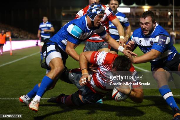Jake Polledri of Gloucester scores the opening try during the Premiership Rugby Cup match between Bath Rugby and Gloucester Rugby at The Recreation...