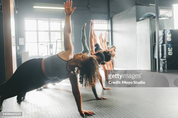 men, women or fitness people in gym workout, training or exercise with personal trainer. friends diversity or floor sports coaching in wellness, health or motivation bodybuilding for stomach muscles - group gym class stock pictures, royalty-free photos & images