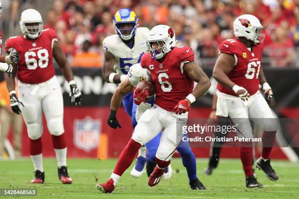 Running back James Conner of the Arizona Cardinals rushes the football against the Los Angeles Rams during the first half of the NFL game at State...