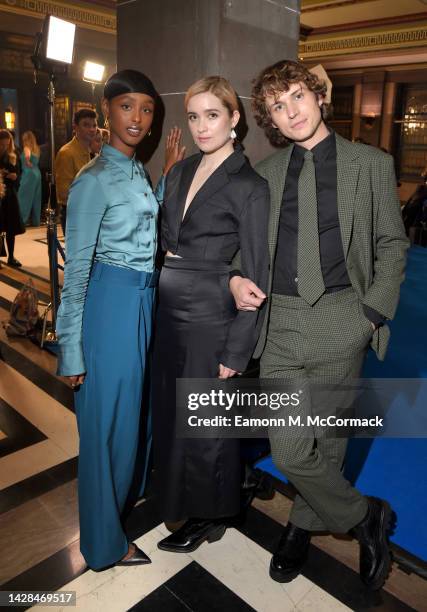 Kosar Ali, Alice Englert and Nicholas Denton attend the LIONSGATE+ launch at Freemasons Hall on September 28, 2022 in London, England.