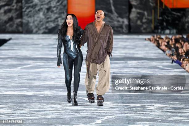 Singer Cher and Olivier Rousteing walk the runway during the Balmain Womenswear Spring/Summer 2023 show as part of the Balmain Festival V03 during...