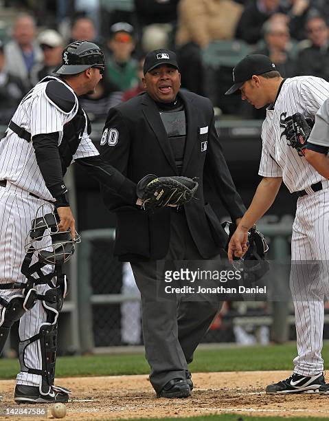 Pierzynski and Jake Peavy of the Chicago White Sox argue a call with home plate umpire Adrian Johnson during the opening day game against the Detroit...