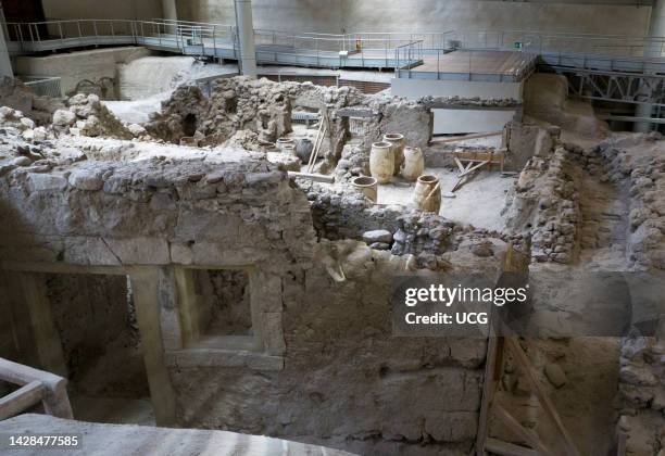 Excavation of Akrotiri, the Cycladic settlement buried by tephra from the Minoan eruption of the volcano Thera, Santorini, Greece..