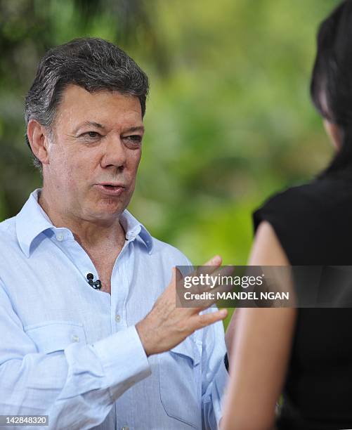 Colombian President Juan Manuel Santos speaks to ABC Correspondent Reena Ninan during an interview at a hotel in Cartagena, Colombia April 13, 2012...