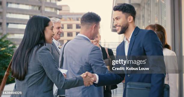 handshake, teamwork and welcome with a business man and woman shaking hands and working as a team. thank you, meeting and b2b with a female employee and male colleague at work in collaboration - thank you smile stock pictures, royalty-free photos & images