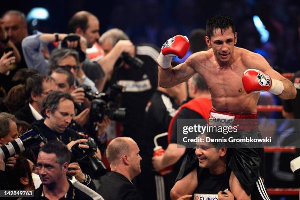 Felix Sturm of Germany celebrates after winning the WBA middleweight world championship fight against Sebastian Zbik of Germany at Lanxess Arena on...