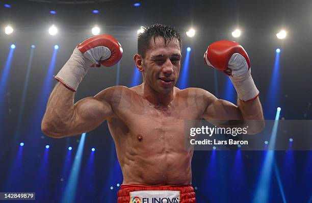 Felix Sturm of Germany celebrates after winning his WBA World Championship middleweight fight against Sebastian Zbik of Germany at Lanxess Arena on...