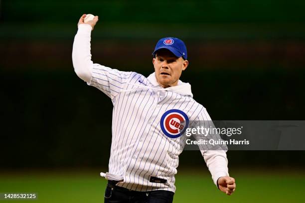 Chris Mueller of the Chicago File FC throws a ceremonial first pitch before the game between the Chicago Cubs and the Philadelphia Phillies at...