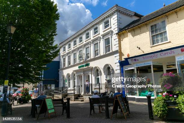 Branch of Lloyds bank in historic building in town center, Beccles, Suffolk, England, UK.