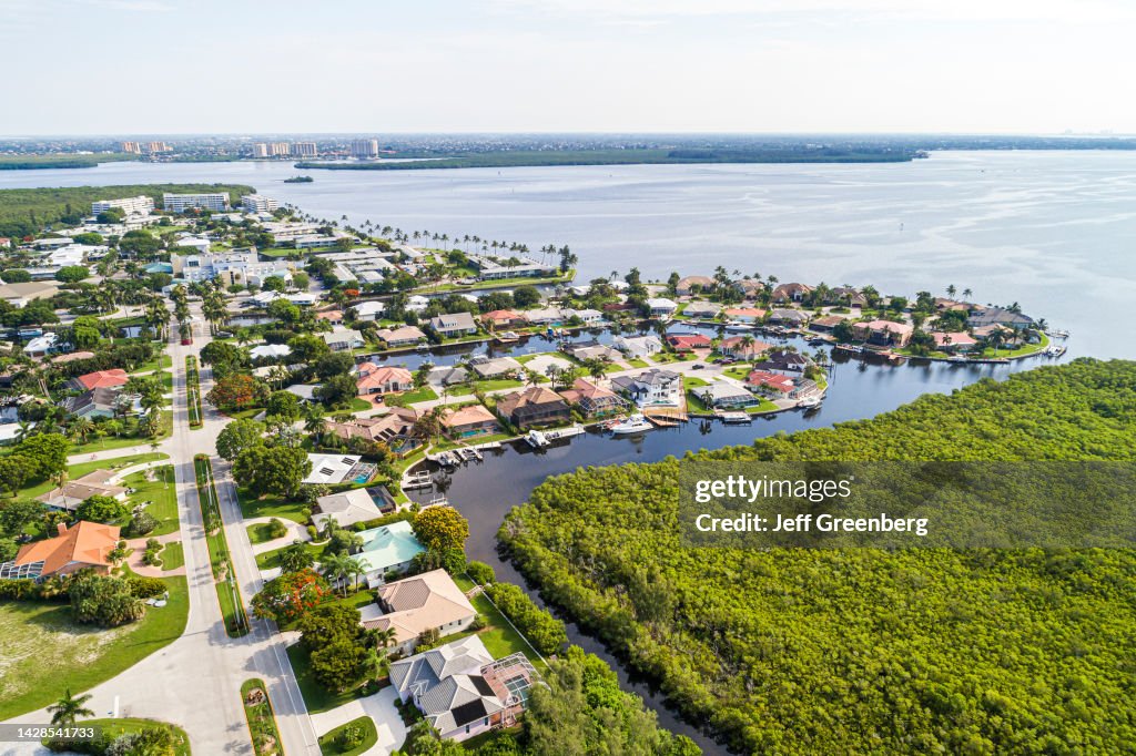 Fort Myers, Florida, Palm Acres housing development encroaching on Caloosahatchee River wetlands