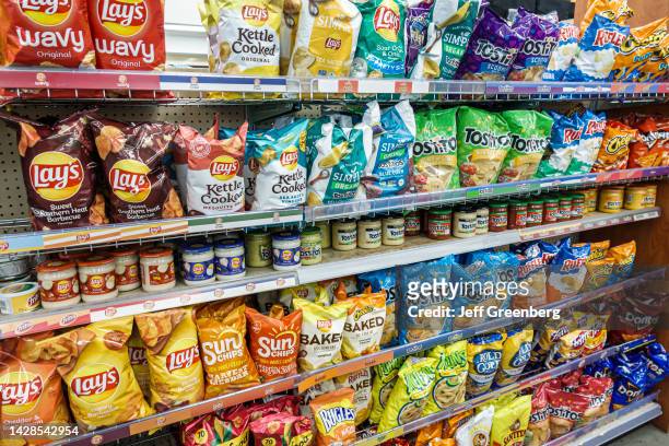 Miami Beach, Florida, convenience store junk food potato chips snack food display.