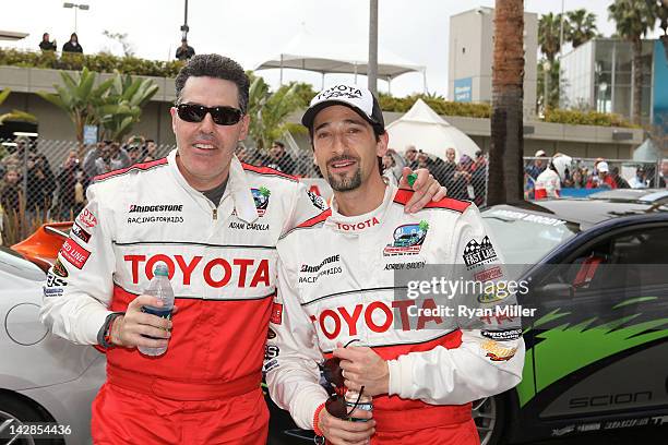 Actor Adam Corolla and Adrien Brody pose during the 36th Annual Toyota Pro/Celebrity Race - Press Practice Day of the Toyota Grand Prix of Long Beach...