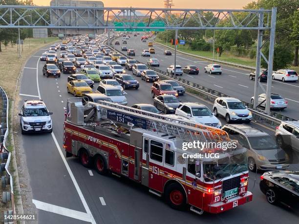 Traffic accident on Grand Central Parkway first responders with backed up traffic, Queens, New York.