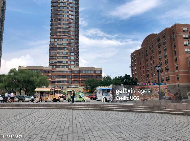 Group of food trucks along waterfront in Long Island City, Queens, New York.