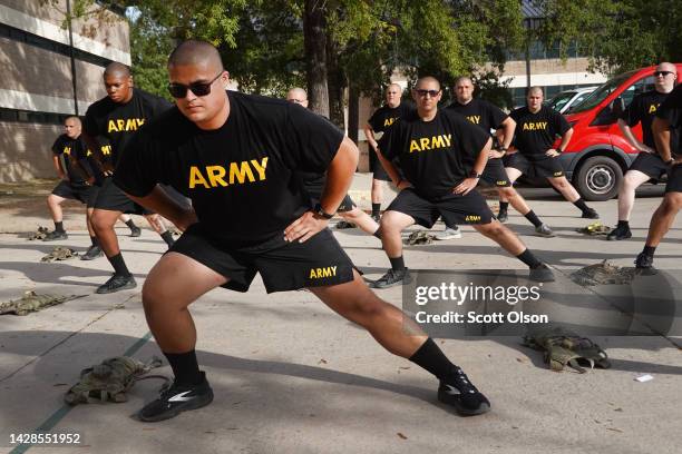 Army trainees participating in the Army's new Future Soldier Prep Course stretch during a physical training session at Fort Jackson on September 28,...