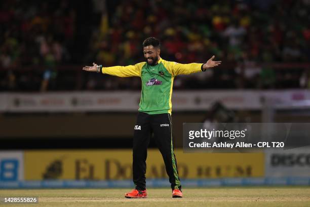 Mohammad Amir of Jamaica Tallawahs celebrates getting the wicket of Paul Stirling of Guyana Amazon Warriors during the Qualifier 2 match between...