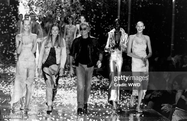 Designer Roberto Cavalli walks the runway at show finale with wife Eva Cavalli and model Eva Herzigova, Alek Wek and Shirley Mallmann.