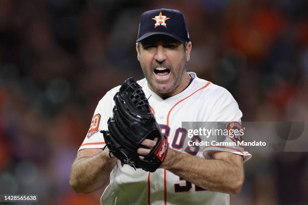 Justin Verlander of the Houston Astros reacts to striking out Pavin Smith of the Arizona Diamondbacks to get out of the seventh inning with two men...