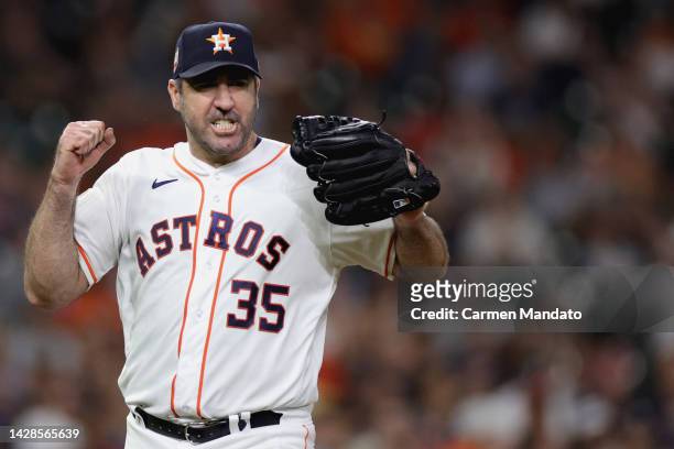Justin Verlander of the Houston Astros reacts to striking out Pavin Smith of the Arizona Diamondbacks to get out of the seventh inning with two men...