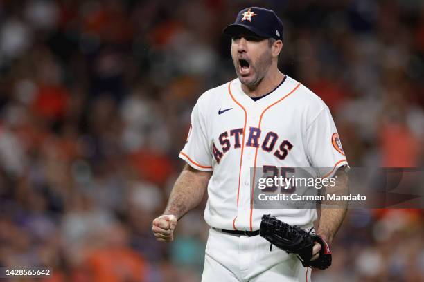 Justin Verlander of the Houston Astros reacts to striking out Pavin Smith of the Arizona Diamondbacks to get out of the seventh inning with two men...