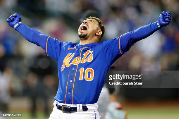 Eduardo Escobar of the New York Mets reacts after hitting a walk-off RBI single during the tenth inning against the Miami Marlins at Citi Field on...