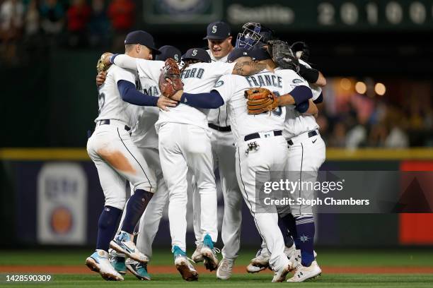 The Seattle Mariners celebrate their 3-1 win against the Texas Rangers at T-Mobile Park on September 28, 2022 in Seattle, Washington.