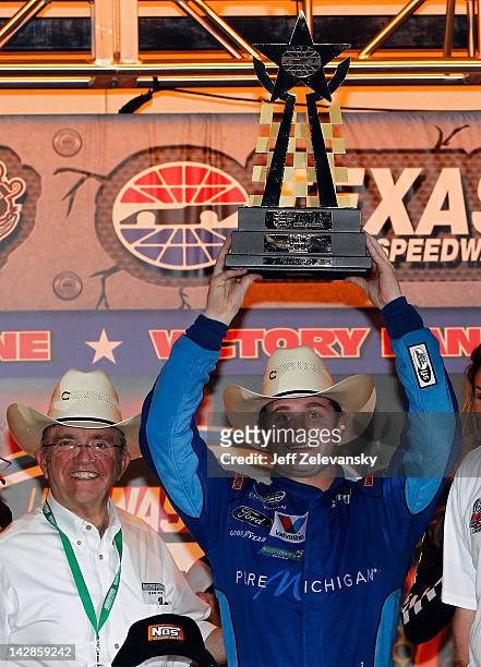 Ricky Stenhouse Jr., driver of the Pure Michigan Ford, celebrates his win in victory lane with owner Jack Roush during the NASCAR Nationwide Series...