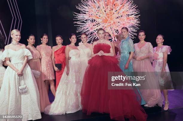 Adele De Fontenay, Lison Di Martino, Agatha Maksimova, Christophe Guillarmé, Andrea Furet, April Benayoum, Magda Swider and models pose on the runway...