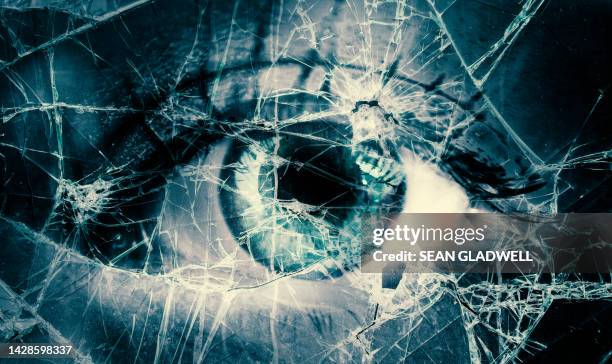 eye and broken glass - domestic violence stock pictures, royalty-free photos & images