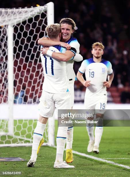 Conor Gallagher of England celebrates with team mate Anthony Gordon after scoring their sides second goal during the International Friendly Match...