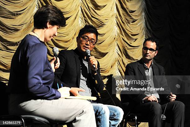 Translator Angela Killoren, director Kang Je-gyu and Film Independent at LACMA Assistant Curator Bernardo Rondeau participate in a Q&A session...