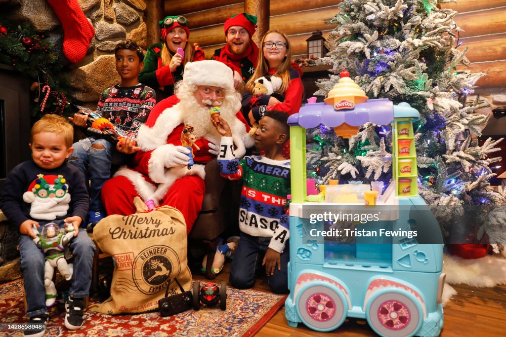 Santa with children in the grotto as Hamleys unveil their Top Ten Santa with children in the grotto as Hamleys unveil their Top Ten