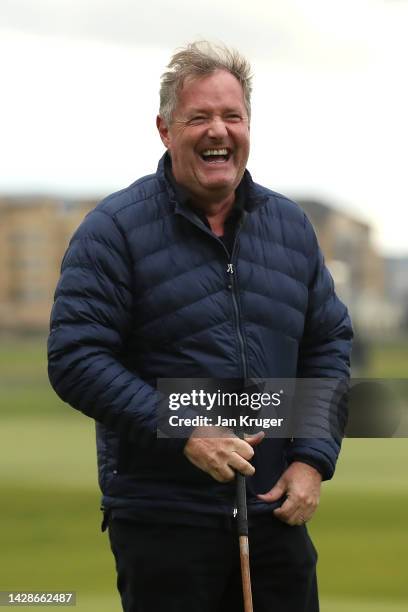 Piers Morgan laughs during 'The Hickory Challenge' prior to the Alfred Dunhill Links Championship on the Old Course St. Andrews on September 28, 2022...