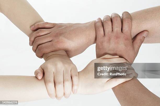Men And Woman Interlocking Hands Photos and Premium High Res Pictures ...