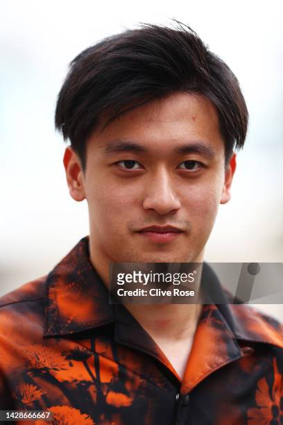Zhou Guanyu of China and Alfa Romeo F1 walks in the Paddock during previews ahead of the F1 Grand Prix of Singapore at Marina Bay Street Circuit on...