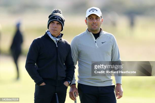 Gianfranco Zola and Francesco Molinari of Italy interact on the 14th green on Day One of the Alfred Dunhill Links Championship at Carnoustie Golf...