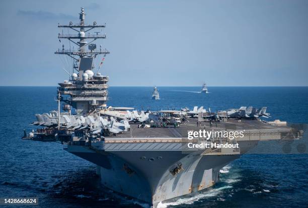 In this handout image provided by the South Korean Defense Ministry, The U.S. Nuclear-powered aircraft carrier Ronald Reagan seen during a US-South...