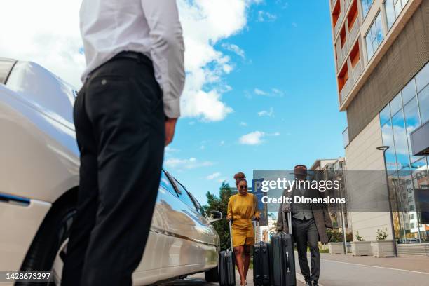 chauffeur waiting for vip clients. - valet stockfoto's en -beelden